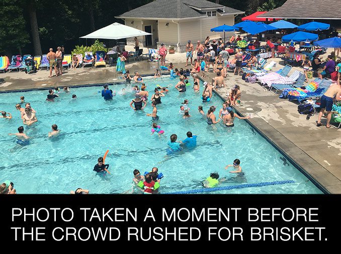Photo taken a moment before the crowd rushed for brisket. Photo taken a moment before the crowd rushed for brisket.